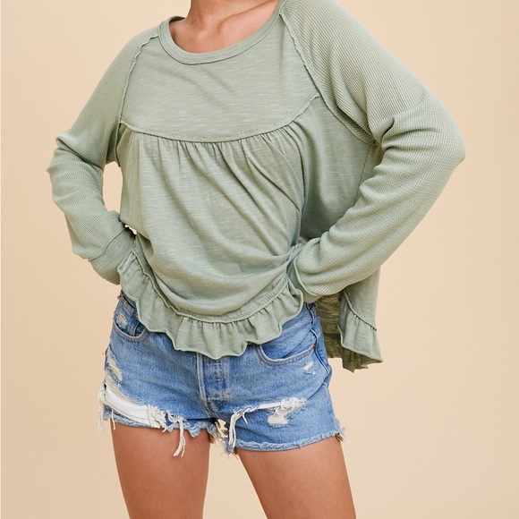 Ruffle top with waffle sleeve - Picture 1 of 4